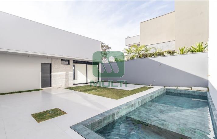 Casa de Condomínio à venda com 4 quartos, 317m² - Foto 1